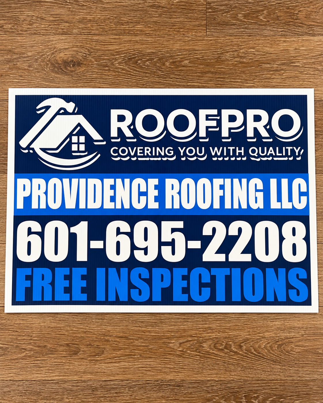 Clean real custom roofing yard and jobsite sign example